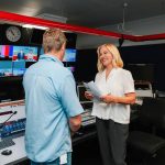 Mary Lambie training in a TV editing studio